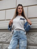 Maglione over con dettaglio in jeans