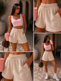 Short con scritta Love