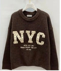 Maglione New York con dettaglio borchie