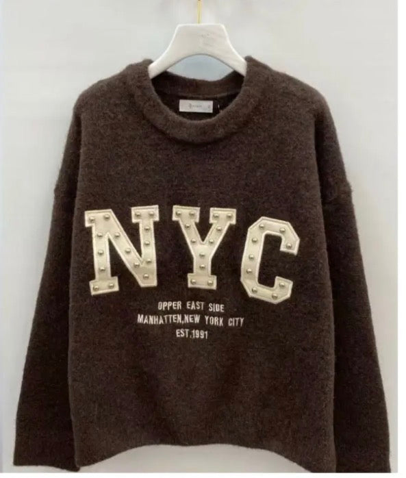 Maglione New York con dettaglio borchie