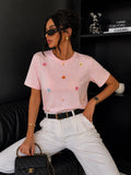 T-shirt con margherite