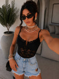 Short in jeans con cuore in strass