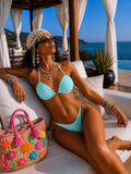 Bikini con cuore verde acqua