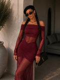 Abito bordeaux con trasparenza