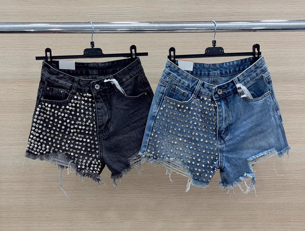 Jeans nero con borchie