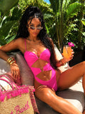 Costume intero con cuore fuxia