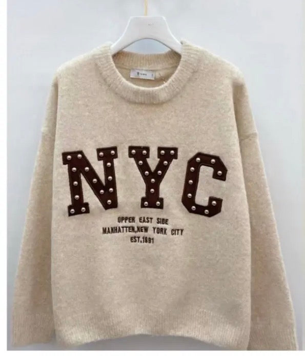 Maglione New York con dettaglio borchie