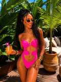 Costume intero con cuore fuxia