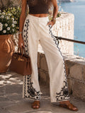Completo Camicia pantaloni con ricami bianca