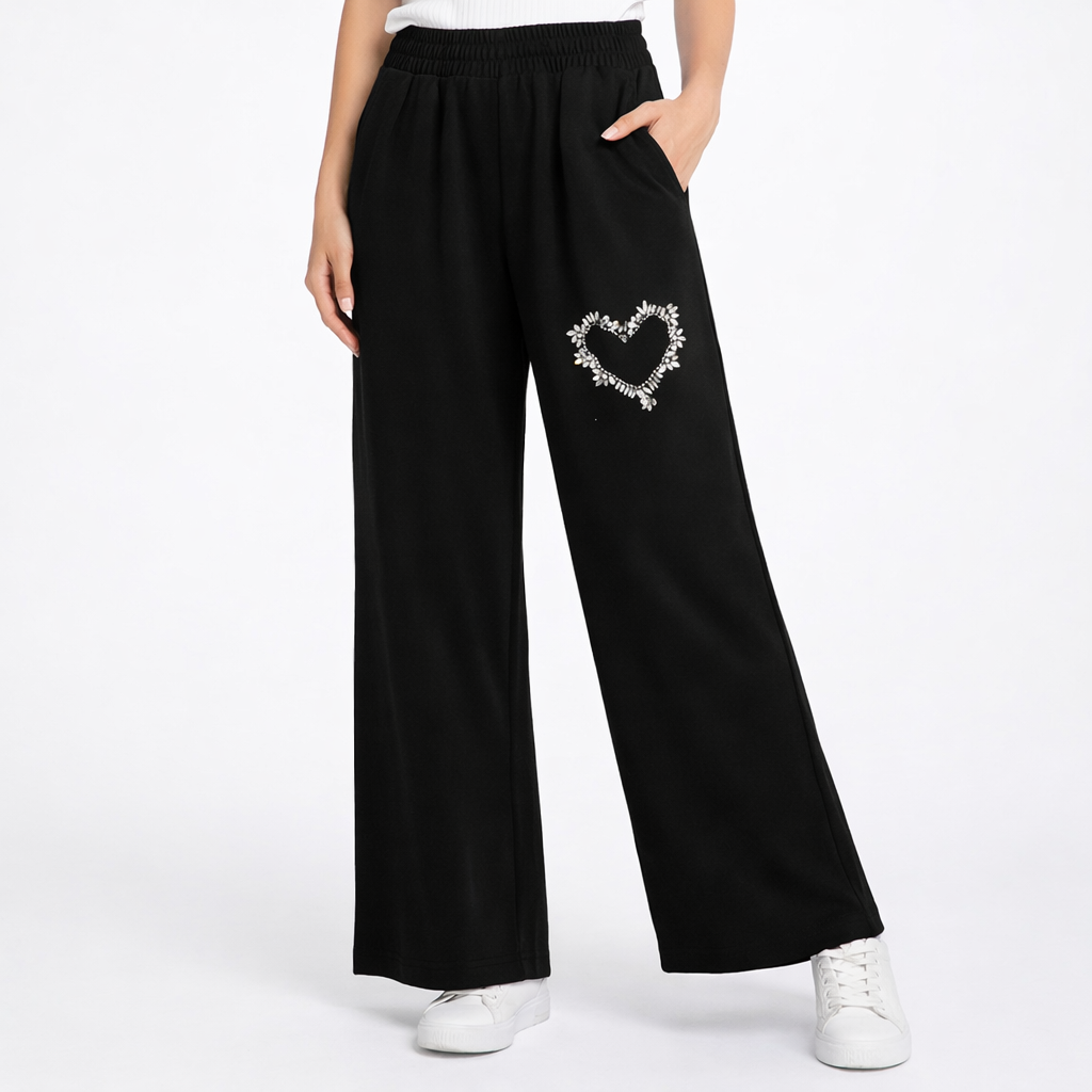 Tuta con strass a cuore