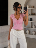 Top con spallina in pizzo e bottoncini