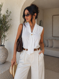 Blusa con gioiello