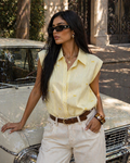 Camicia smanicata con fiocchetti
