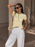 T-shirt con margherite ricamate