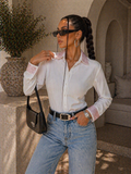 Camicia con brillantini su polso e maniche