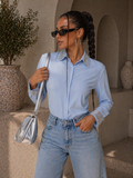 Camicia con brillantini su polso e maniche