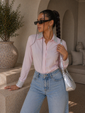 Camicia con brillantini su polso e maniche
