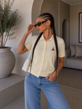 Maglia Teddy con bottoncini
