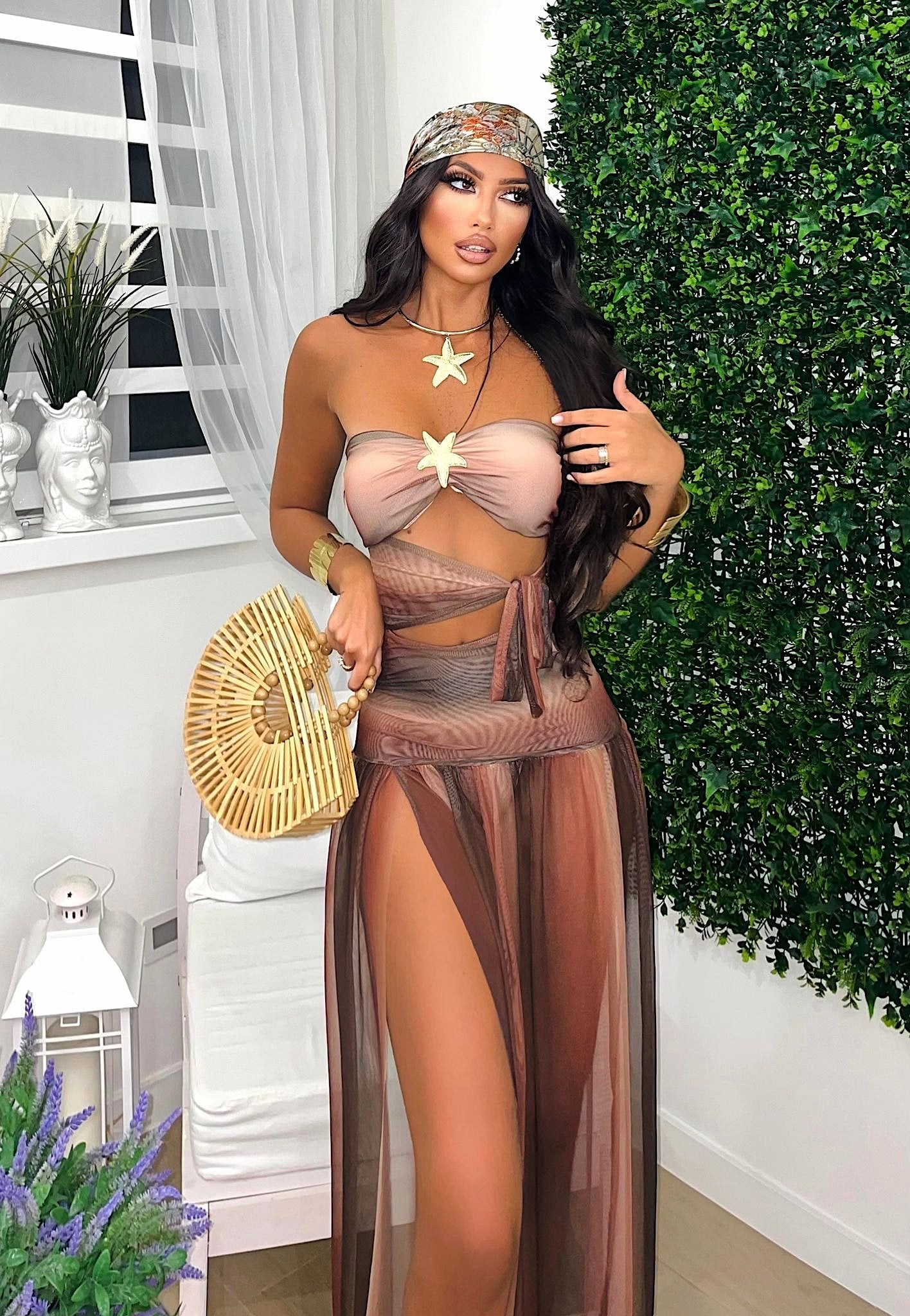 Body due pezzi con stella nude