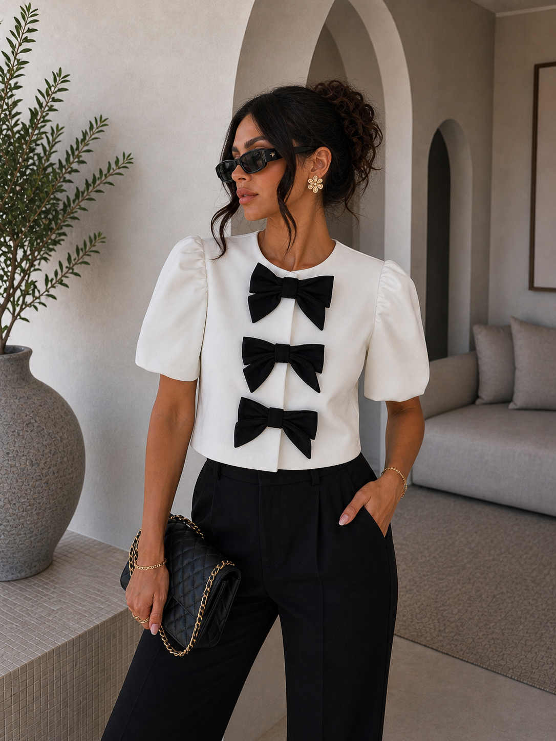 Giacca crop con fiocchi bianco nero