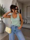 Top smanicato a zig zag con pizzo