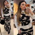 Completo top e pantalone cow print