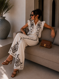 Completo Camicia pantaloni con ricami bianca