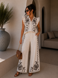 Completo Camicia pantaloni con ricami bianca