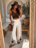 Completo Camicia pantaloni con ricami bianca