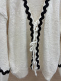 Cardigan con ricamo e lacci