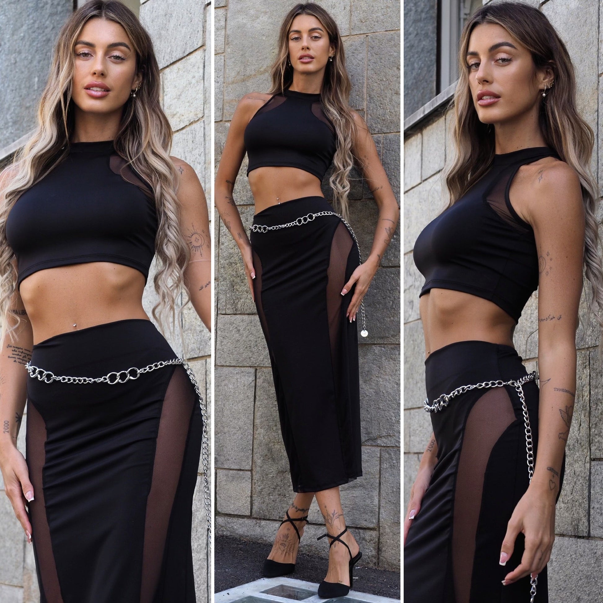 Completo top e gonna nero con trasparenze