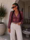 Cardigan in pizzo ricamato trasparente