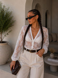Cardigan in pizzo ricamato trasparente