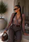 Cardigan in pizzo ricamato trasparente