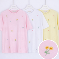 T-shirt con margherite ricamate