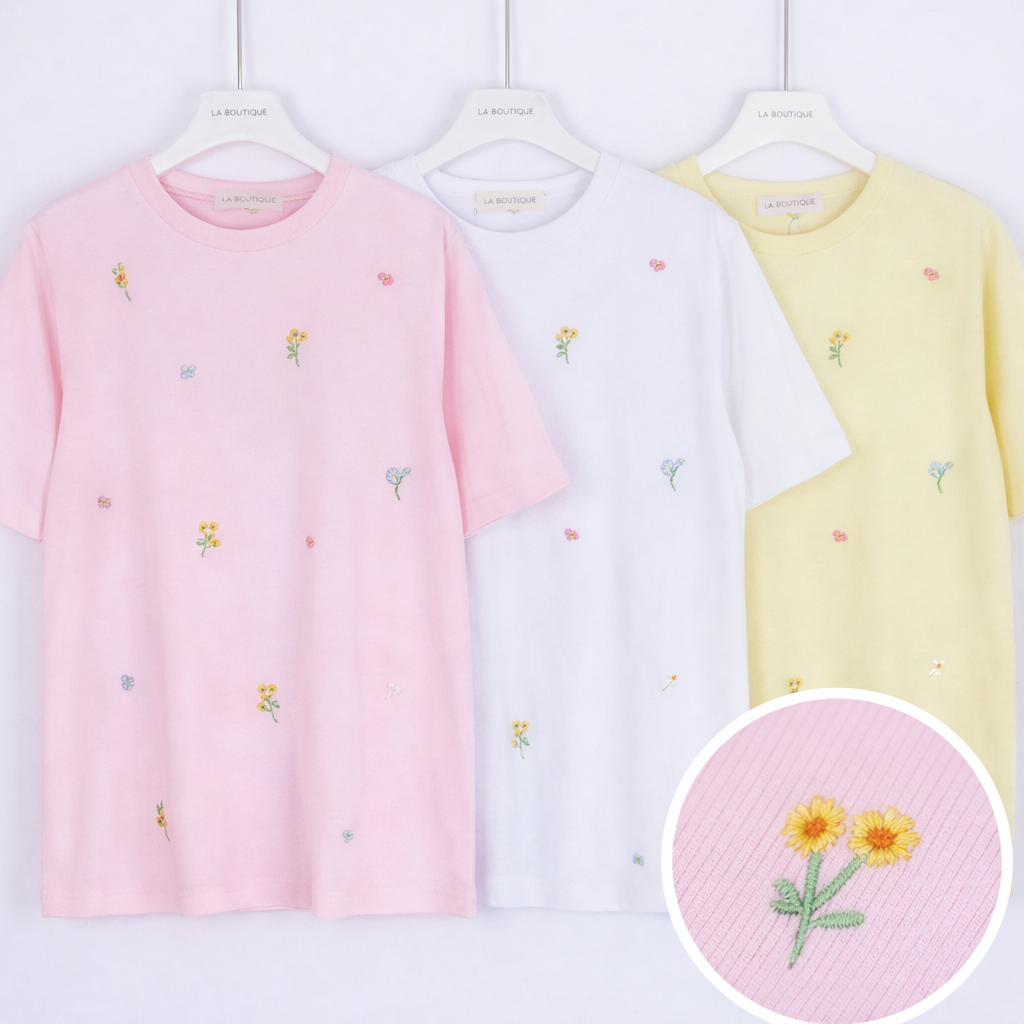 T-shirt con margherite ricamate