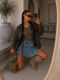 Gonna in denim con pieghe