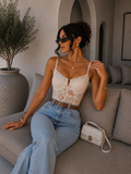 Body in pizzo con spalline