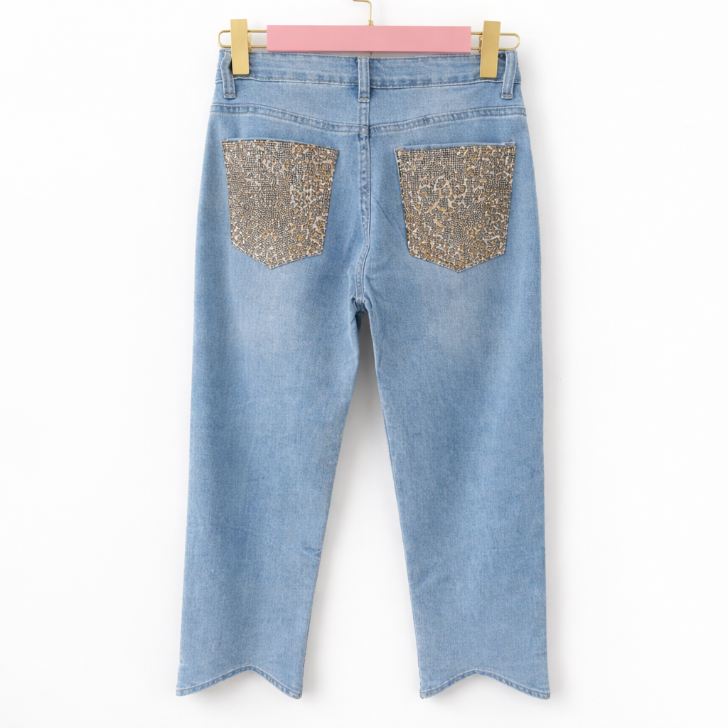 Jeans con tasca glitter maculata