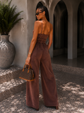Tuta denim nero elasticizzata con tasche