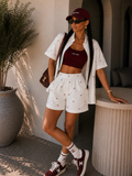 Completo con fiocchetti short e camicia
