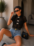 Camicia con fiocchi decorativi
