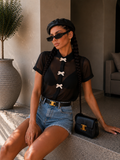 Camicia con fiocchi decorativi