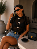 Camicia con fiocchi decorativi