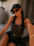 Top animalier con bottoncini