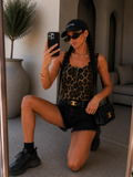 Top animalier con bottoncini