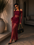 Abito bordeaux con trasparenza