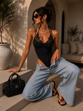 Body con pizzo e bretelle sottili
