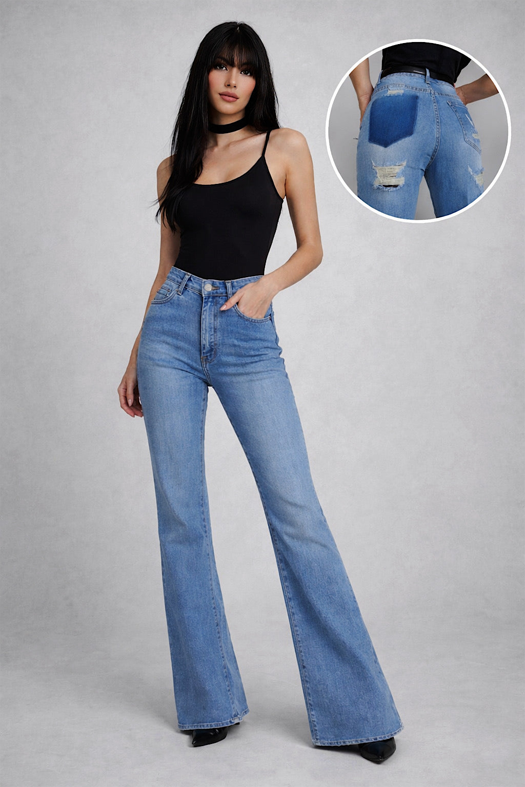 Jeans con strappi e dettaglio tasca