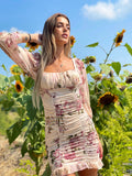 Abito arricciato con fiori rosa
